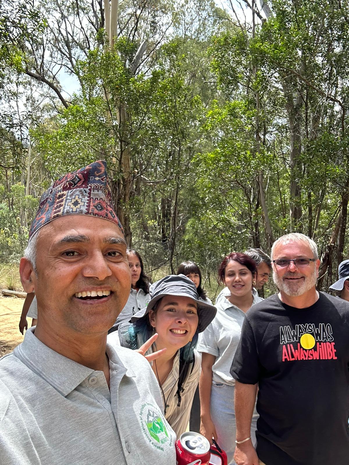 President Yakindra Timilsena with MLA Laura Nuttal and Local Ngunnawal Elder Bradley Bell